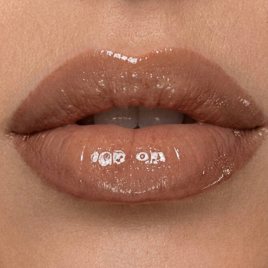 رمآل 🤎 Lipgloss - Joories